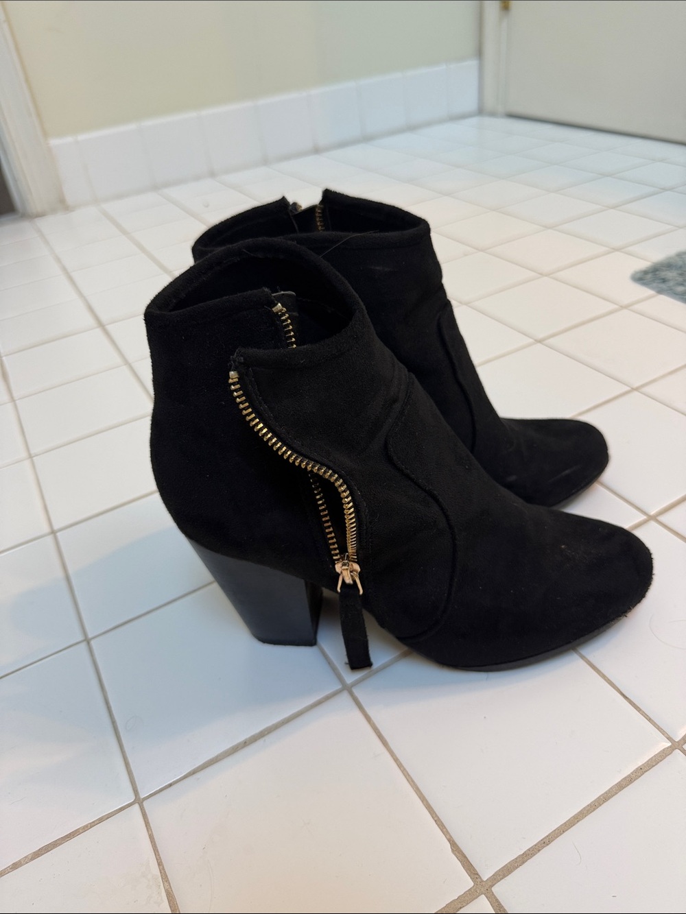 Women’s Black Suede Ankle Booties with Gold Zip Accent